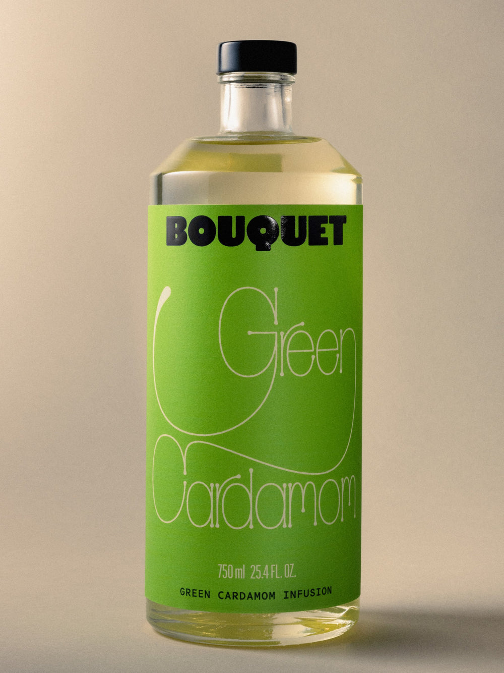 Bottle of Bouquet Green Cardamom infusion with a bright green label, bold black BOUQUET logo, and large cream colored graphic. Text reads ‘Green Cardamom’ in thin elongated cream color script. 750 ml (25.4 fl oz).